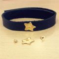 Star to rivet 14mm gold tone