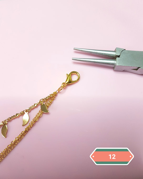 Self-hardening horn and feather necklace : Step 12 Self-hardening horn and feather necklace : Step 12