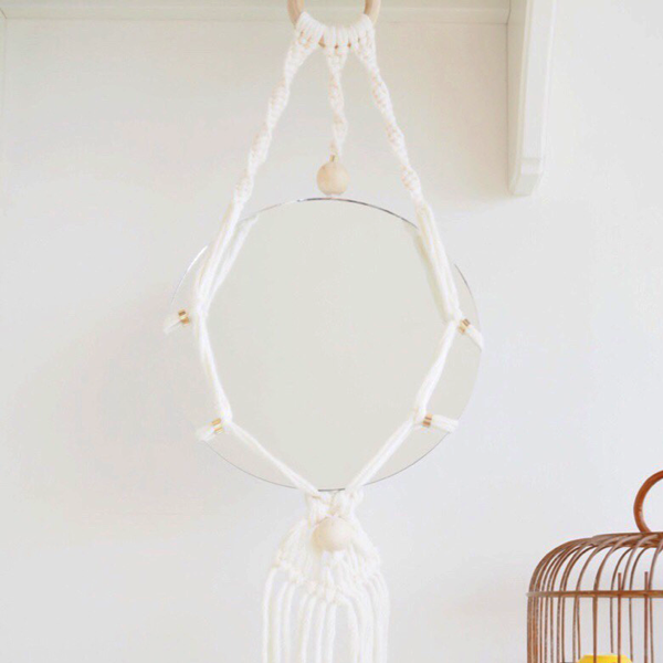 DIY hanging mirror with macramé and wooden beads