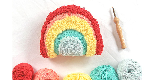 DIY Punch needle rainbow cushion