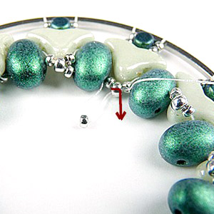 step 10 Customize Elsa pocket mirror Puca glass beads