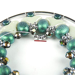 step 15 Customize Elsa pocket mirror Puca glass beads