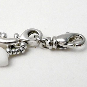 step 13 Aelis bracelet with Bowtrio interlayer and Paros glass beads by Puca