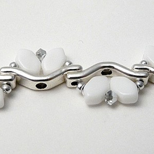 step 8 Aelis bracelet with Bowtrio interlayer and Paros glass beads by Puca