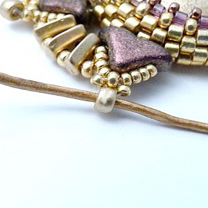 step 19 - Gaia cabochon pendant, Piros and Helios glass beads by Puca