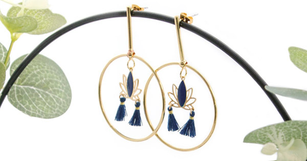 Earstuds with gold and blue lotus charms Earstuds with gold and blue lotus charms