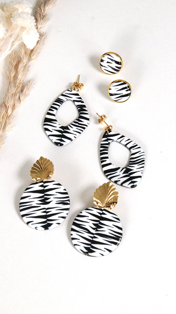 Schema  Polymer zebra duck earrings