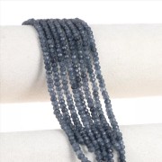 Flattened round faceted 4x3 mm tinted gemstone - Quartz Bleu Marine x35cm