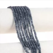 Flattened round faceted 4x3 mm tinted gemstone - Quartz Bleu Marine x35cm