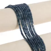 Flattened round faceted 4x3 mm tinted gemstone - Quartz Bleu Marine x35cm