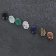 8x6mm Faceted oval cabochon - Black Onyx x1