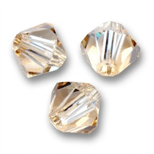 PureCrystal 5328 Crystal Bicones 4mm Crystal Golden Shadow x50