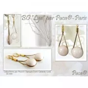 18mm Glass round cabochon by Puca® - Opaque Beige Spotted x1