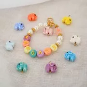 Assortment of 200 beads round alphabet letters in relief 10mm - Pastel Gold x1