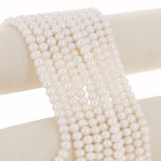 8x6mm Flattened round freshwater pearls - Grade AAA White x4