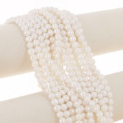 6.5x7mm Flattened round freshwater pearls - Grade AA- White x39cm