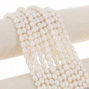 Rice grain freshwater pearls - 8x7 mm - Grade AA White x35cm