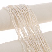 3x2.5mm Round flattened irregular freshwater pearls - Grade AA+ White x38cm