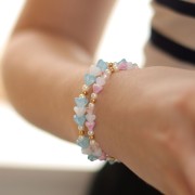 5x6mm Glass flower beads - Crystal Metallic blue x10