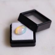 13.9x10.1mm Ethiopian oval opal - 4.7 cts x1