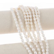 7x6mm Freshwater beads rice grain - Grade AAA - White x39 cm