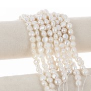 10x9mm Baroque freshwater pearls - Grade AA - White x4