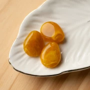 Flat irregular bead 22x17 mm in translucent resin - Honey yellow marbled x1