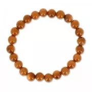 Elastic bracelet 18 cm 8 mm round beads Gold Stone
