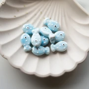19x11.5 mm ceramic fish bead - Sky blue - White x1