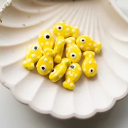 Ceramic fish bead 19x11.5 mm - Yellow - White x1