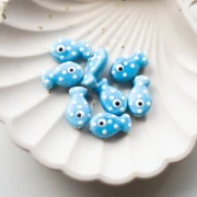 Ceramic fish bead 19x11.5 mm - Blue - White x1