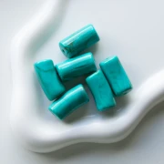 Curved tube beads 29x14 mm in opaque acrylic - Marbled Turquoise - Brown x10