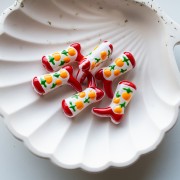 Pearl Santiag - cowboy boot 24x17 mm glass - Fruit motif - Red - Peach