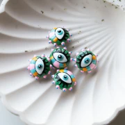 17 mm round flattened glass bead - eye pattern - Pink - Light blue - Green x1