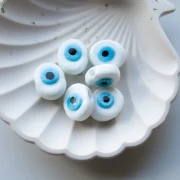Oval irregular 21x17 mm glass bead - eye pattern - White - Sky Blue x1