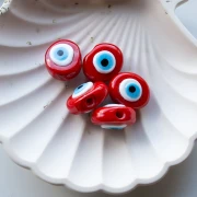Oval irregular 21x17 mm glass bead - Eye motif - Red - Sky Blue x1