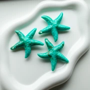 Acrylic starfish pendant 49x45 mm - Turquoise - Marbled brown x1