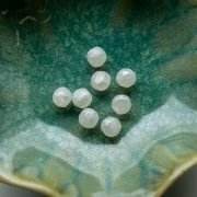 8 mm irregular round faceted opaque resin beads - Pearlescent white x8