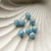 8 mm irregular round faceted beads, translucent resin - Smoky blue marbled x8