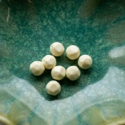 8 mm irregular round faceted opaque resin beads - Ecru x8