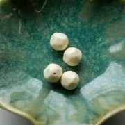 12 mm irregular round faceted opaque resin bead - Ecru x4