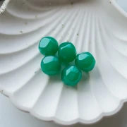 14 mm irregular round faceted bead, clear resin - Jade x1