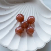 14 mm irregular round faceted bead, clear resin - Brown x1