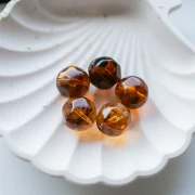 Round irregular faceted resin beads 16 mm Topaz marbled x1