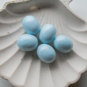 21x17 mm olive-colored opaque resin bead - Baby blue marbled x1