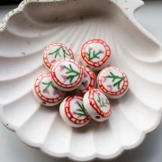 19 mm round flattened ceramic bead - flowers - White - Pink x1