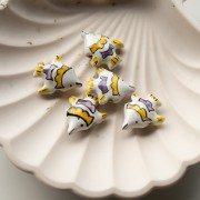 Ceramic fish bead 18x21 mm - White - Yellow x1