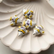 Ceramic fish bead 18x21 mm - White - Yellow x1