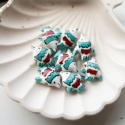 Ceramic fish bead 18x21 mm - White - Turquoise x1