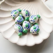 23x16 mm ceramic fish bead - striped pattern - Green - Blue - White x1